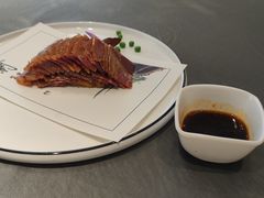 蒜汁沾驴肉-聚宾楼·烤鸭·家宴(科技三路店)