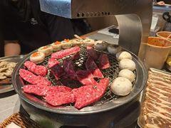 牛肉火山石烤肠-草家酱蟹炭火烤肉店(珲春南路一店)