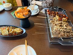 -曼听小寨海鲜烧烤·大连辣炒大王(盖州街店)