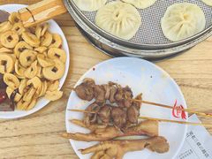 -梁老三麻辣鸡头总店