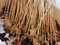 -拈签一笑黄牛肉辣卤串串