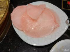 腌萝卜片-猪啊牛呀羊啊铜盘烤肉(正大广场店)