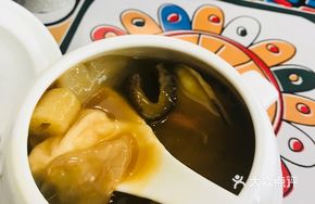 Tan's Buddha Jumps Over the Wall