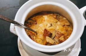 One-Step Buddha Jumps Over the Wall