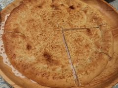 馕坑芝麻馕-巴扎美食·新疆菜·西域歌舞表演餐厅(新疆大厦店)