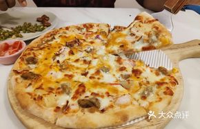 Seafood and Meat Deluxe Pizza