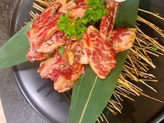 极品浇汁肥牛肋条-草家酱蟹炭火烤肉店(珲春南路一店)