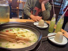 -明何记涮牛肚(品牌首店隋唐植物园南门古城路店)