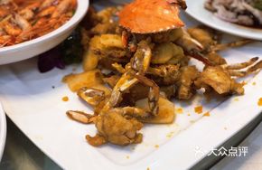 Salted Egg Yolk Stir-Fried Crab with Rice Cake