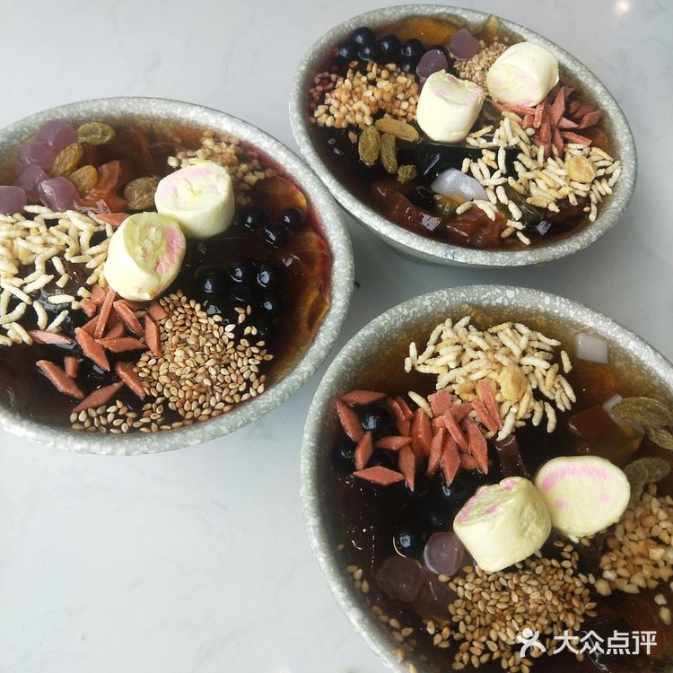 这家的麻酱吃起来就不像好麻酱的样子