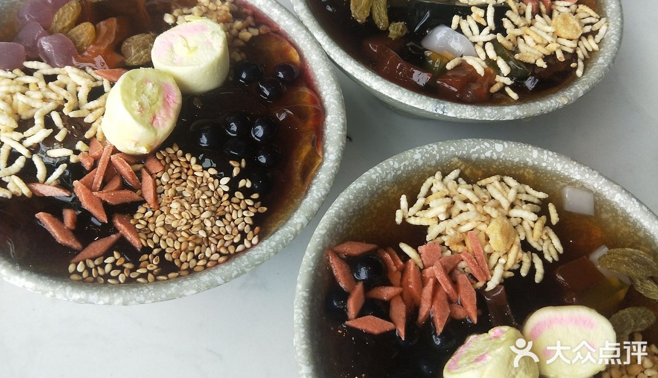 这家的麻酱吃起来就不像好麻酱的样子
