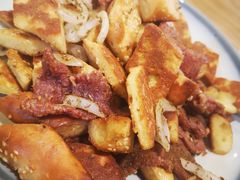 馕丁炒肉-巴依兄弟西域美食(机场店)