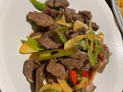 酸木瓜炒牛肉-紫滇源云南生态菜(丹凤街店)