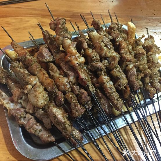 辛记烤羊腿炭锅鱼(黄河路店)