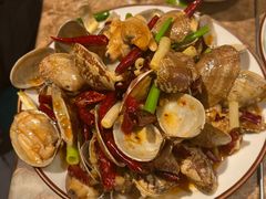 辣炒黄蚬子-金太阳海鲜烧烤·本地人餐厅(东纬路旗舰店)