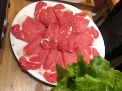 -明何记涮牛肚(品牌首店隋唐植物园南门古城路店)