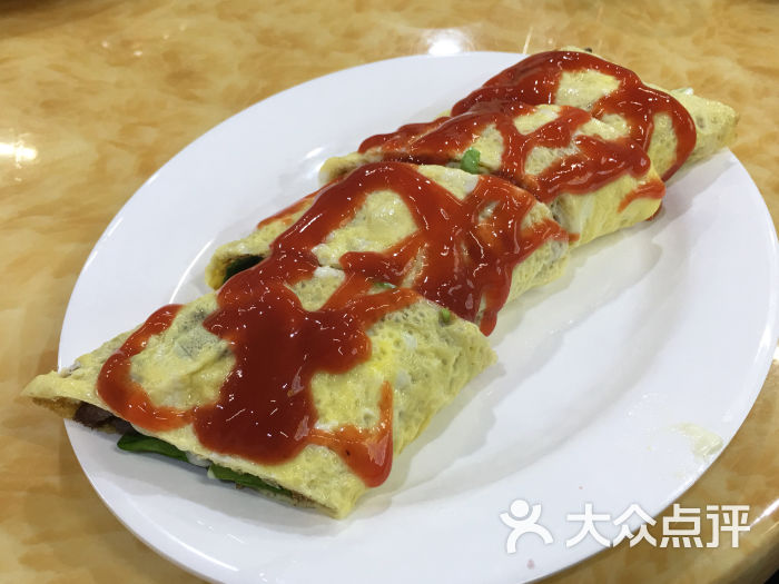 牛尝鲜(铁板牛肉·火锅)蛋包牛肉卷图片 - 第1张