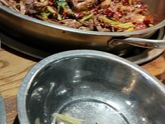 爆辣干锅鸭头-安诚居干锅鸭头(八角店)