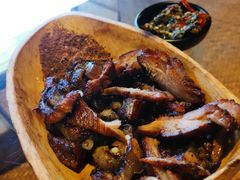 烤猪脸肉-基诺山寨.版纳民族特色菜