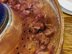 -毛辣果·贵州红酸汤牛肉火锅(西单店)