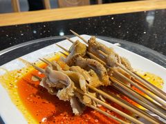 -明何记涮牛肚(品牌首店隋唐植物园南门古城路店)