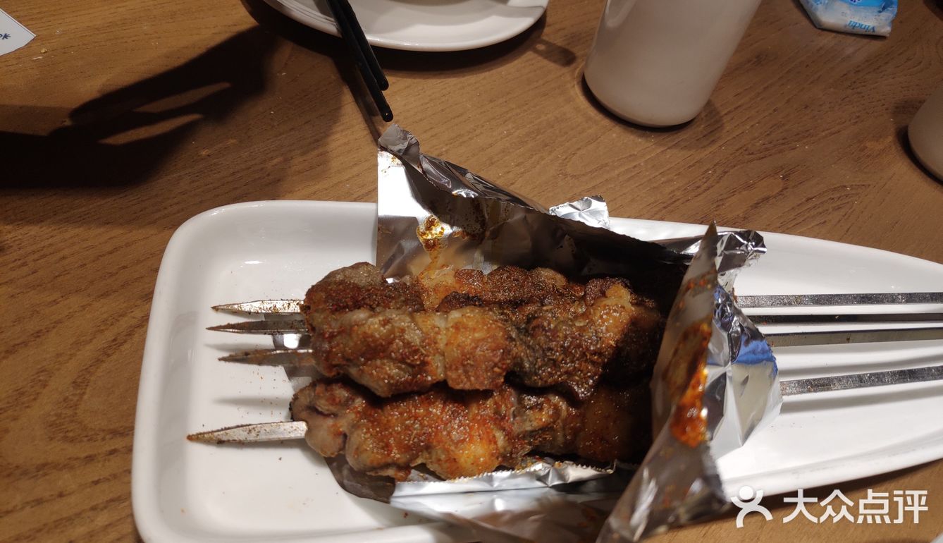 非常好找，门口的大小鼓可以去敲敲