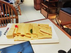 -老牌坊云南鱼豆花火锅(哈西万达店)