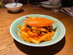 梭子蟹炒年糕-弄堂里·寻味杭州(湖滨银泰in77C区店)