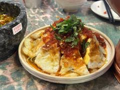 凉拌荷包蛋-浩海火燒雲傣家菜(芮欧百货店)