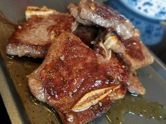 石板火焰牛仔骨-聚鑫阁江浙菜·非遗传承技艺(青村帝华园店)