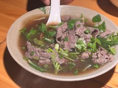 碗碗嫩牛肉翘脚-大众跷脚牛肉馆·非遗传承单位(峨眉山店)