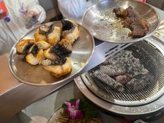 -围炉肉舍•炭烤活鳗•丹东海鲜烤肉(步行街店)