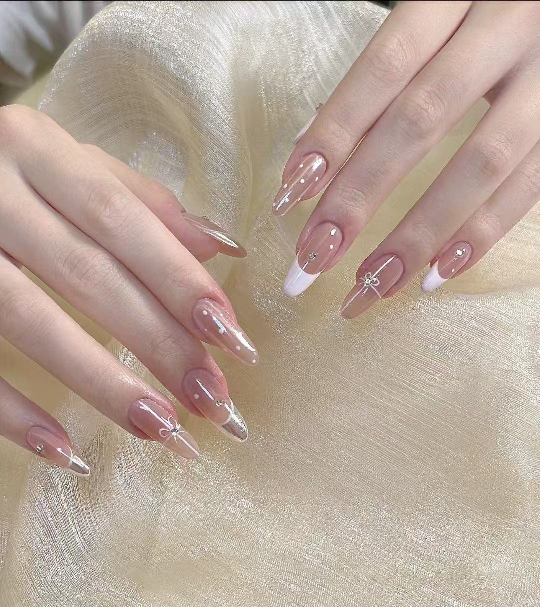 甲片款式猫眼美甲裸色最新美甲新年美甲