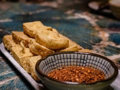 蒜香包浆豆腐-浩海火燒雲傣家菜(芮欧百货店)