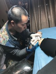 -越域刺青