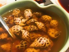 古越陈酿煮花螺-杭州西子湖四季酒店·金沙厅