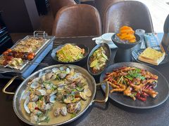 -曼听小寨海鲜烧烤·大连辣炒大王(盖州街店)
