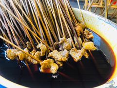 -拈签一笑黄牛肉辣卤串串