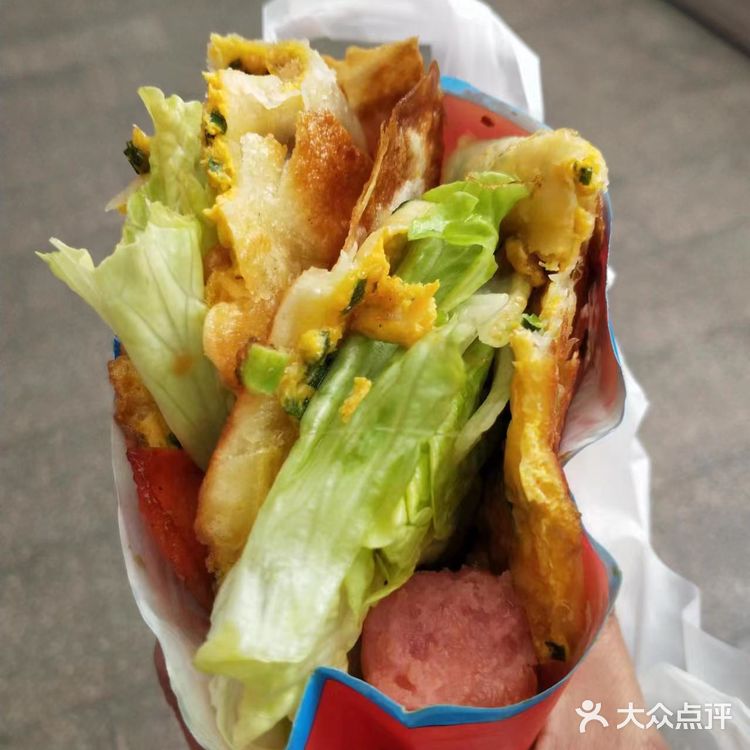 富强街的葱油饼啦啦也有啦