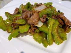 凉瓜炒牛肉-敦煌喜宴(万达广场店)