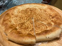馕坑芝麻馕-巴扎美食·新疆菜·西域歌舞表演餐厅(新疆大厦店)