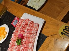 -明何记涮牛肚(品牌首店隋唐植物园南门古城路店)
