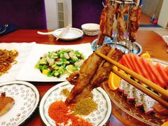 馕坑黄金烤肉-巴依老爷新疆美食(牡丹园店)