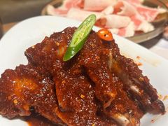 草家招牌酱辣蟹-草家酱蟹炭火烤肉店(珲春南路一店)