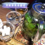 深圳的特色新疆菜大盘鸡羊肉串薄荷茶边吃边看民族舞蹈