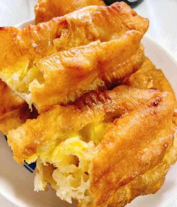 店比较小位置有限,能坐七鸡蛋灌油条开封油条灌鸡蛋开封油膜头加蛋