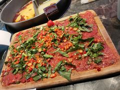 绝代双椒小嫩牛-热火朝天鲜切牛肉火锅(南强街巷店)