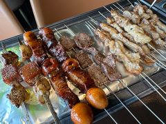 -曼听小寨海鲜烧烤·大连辣炒大王(盖州街店)