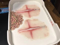 -老牌坊云南鱼豆花火锅(哈西万达店)