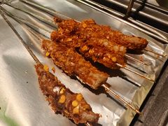 -曼听小寨海鲜烧烤·大连辣炒大王(盖州街店)